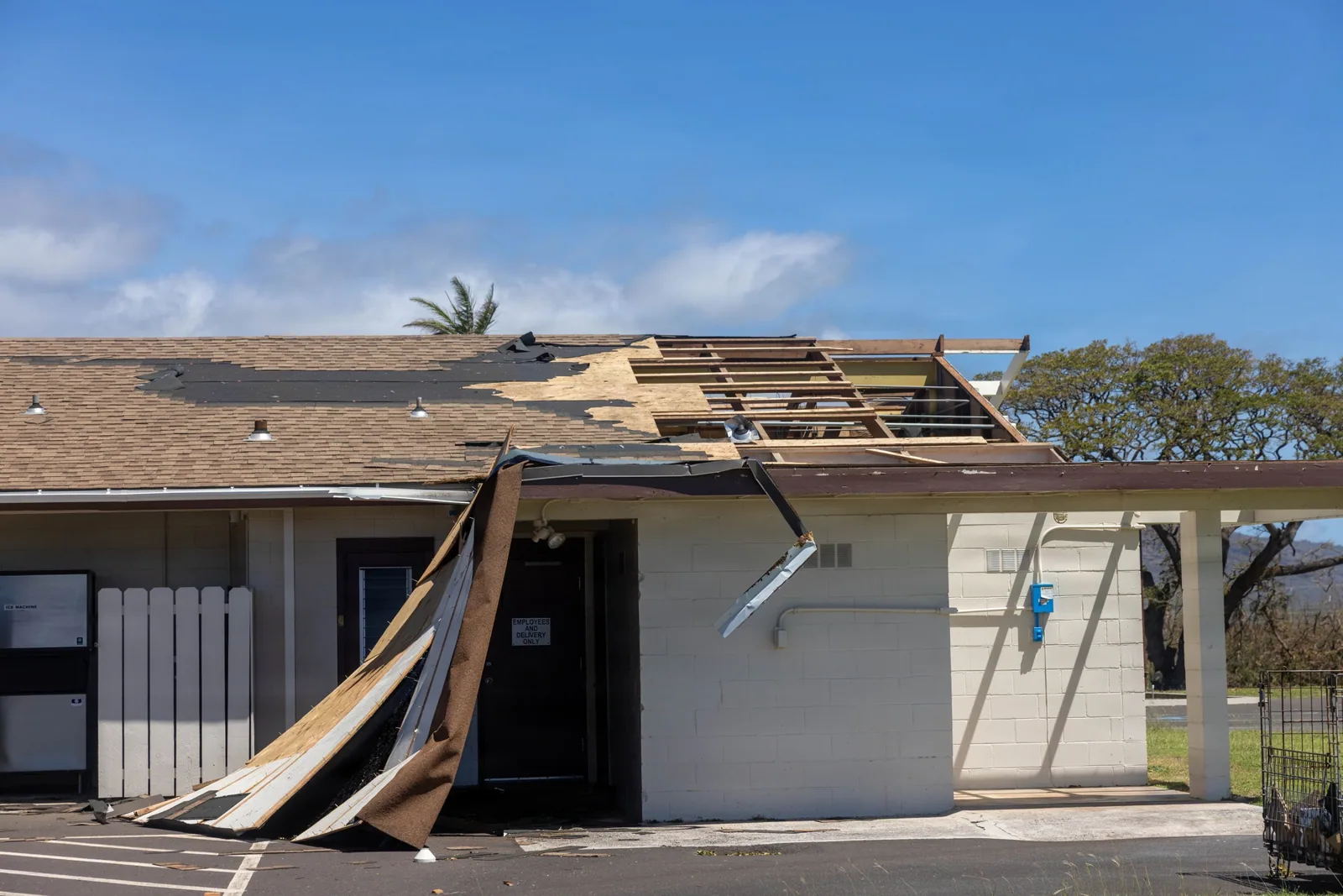 Hurricane-damaged commercial roof near Sugar Land, TX
